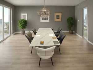 Extending ceramic dining table and chair set in modern dining area 